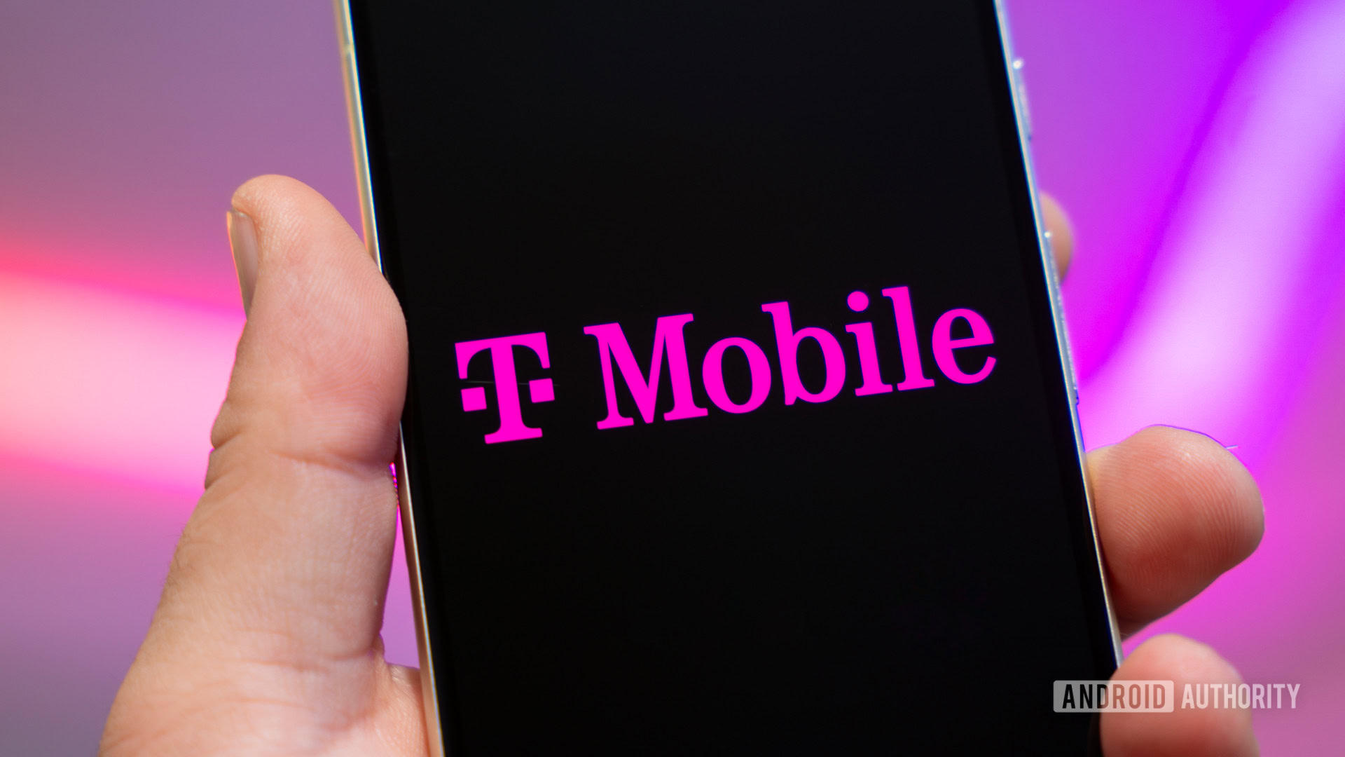 T Mobile logo on smartphone (1) T Mobile logo on smartphone (1)