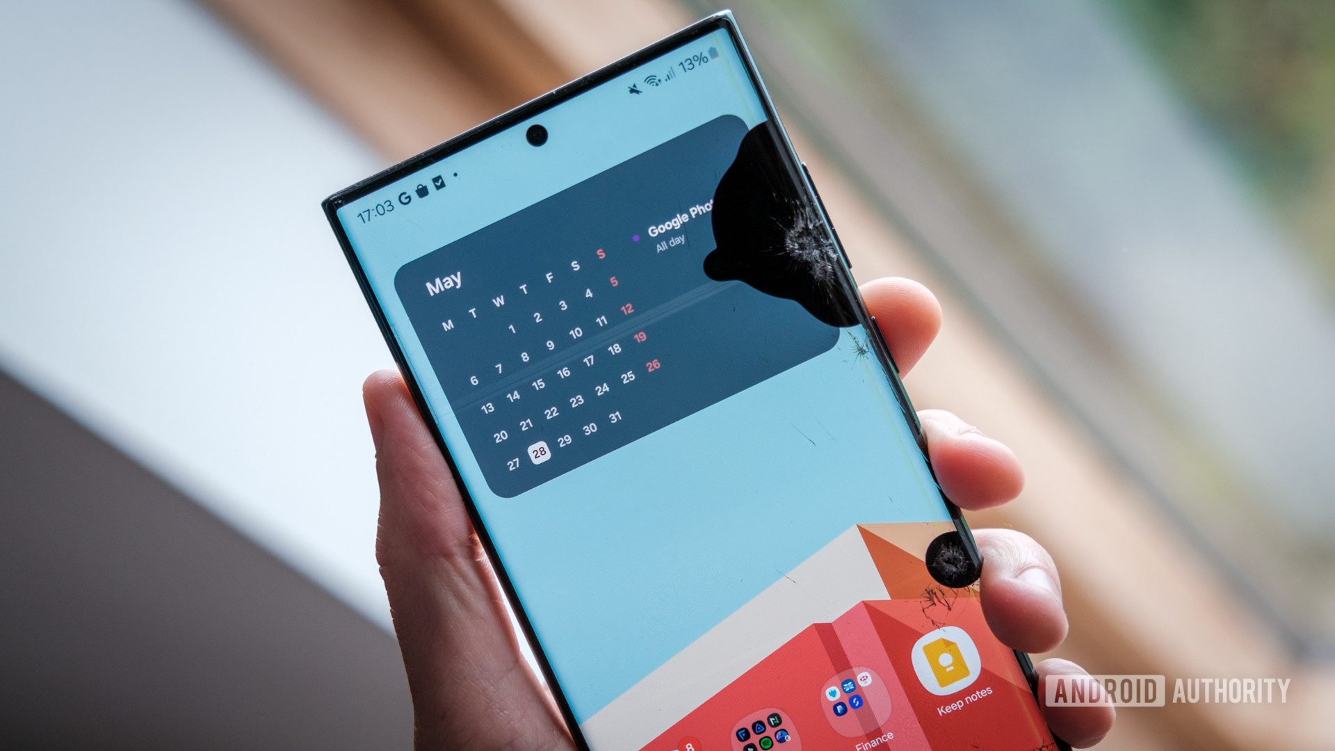 Broken Cracked Screen in hand Broken Cracked Screen in hand